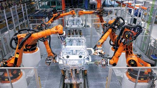 https://upload.wikimedia.org/wikipedia/commons/7/7d/Industrial-robots.jpg